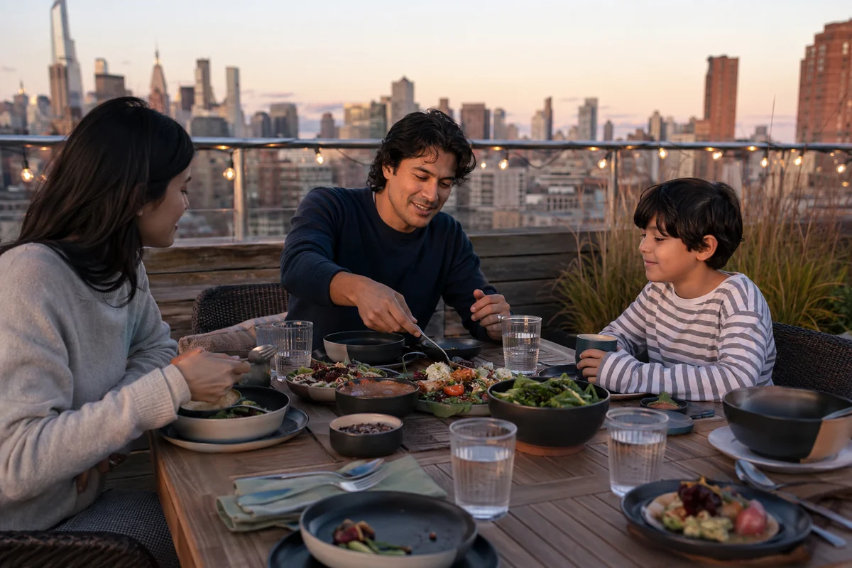 Family using food grade outdoor tableware on an urban rooftop terrace
